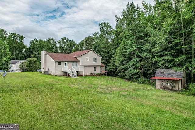 61 Meadowbrook Ln, Carrollton, GA 30117 - view of green lawn featuring a storage unit