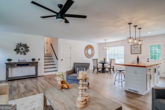 61 Meadowbrook Ln, Carrollton, GA 30117 - living area with light wood-style flooring, healthy amount of natural light, stairway, a ceiling fan, and recessed lighting