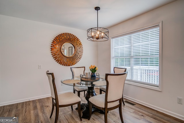 61 Meadowbrook Ln, Carrollton, GA 30117 - dining room with a chandelier and wood finished floors