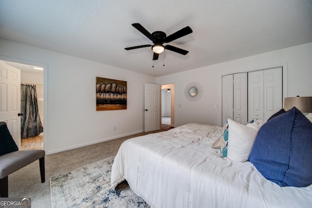 61 Meadowbrook Ln, Carrollton, GA 30117 - bedroom featuring carpet, a closet, ceiling fan, a textured ceiling, and ensuite bathroom