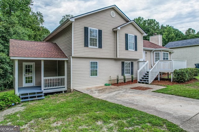 61 Meadowbrook Ln, Carrollton, GA 30117 - split level home featuring a front lawn and covered porch
