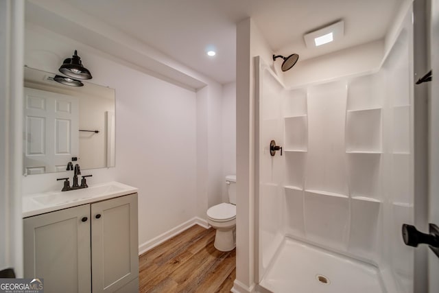 61 Meadowbrook Ln, Carrollton, GA 30117 - bathroom featuring vanity, wood finished floors, and a shower