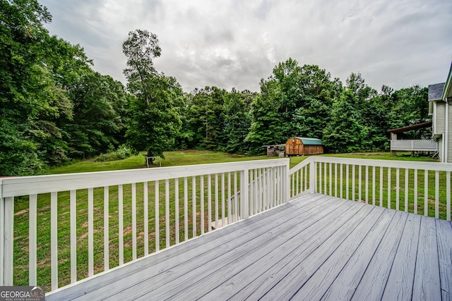 61 Meadowbrook Ln, Carrollton, GA 30117 - deck with a storage shed and a lawn