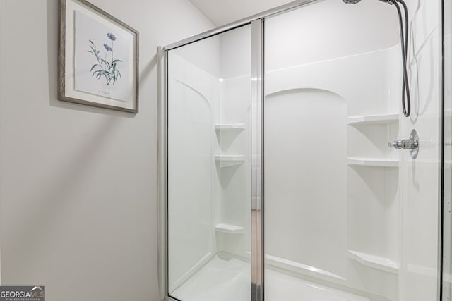 full bathroom featuring a stall shower