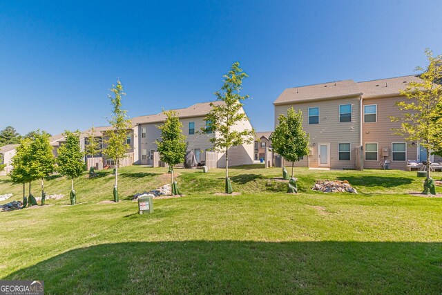 view of yard featuring a residential view