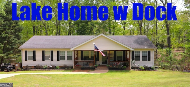 4650 Perry Rd, Gainesville, GA 30506 - ranch-style home with a porch, crawl space, a shingled roof, and a front yard