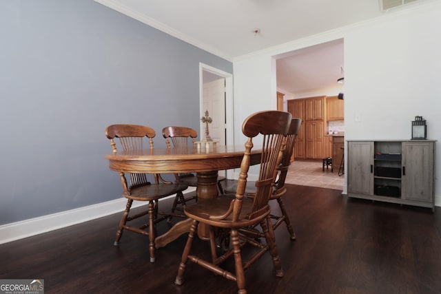 4650 Perry Rd, Gainesville, GA 30506 - dining area with baseboards, ornamental molding, wood finished floors, and visible vents