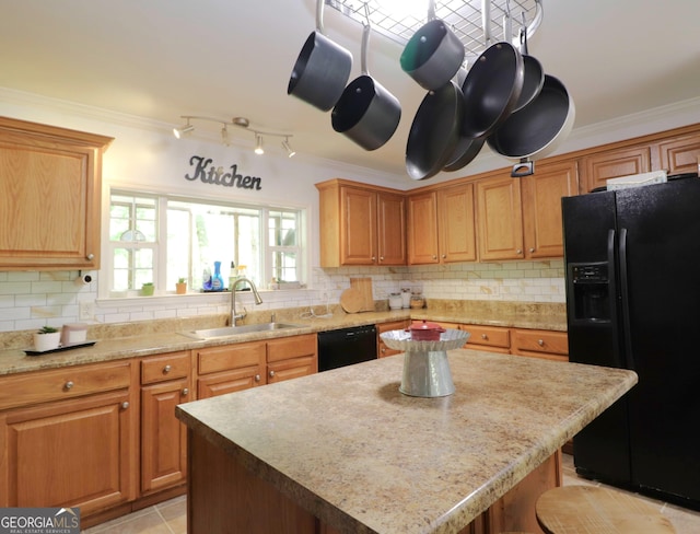 4650 Perry Rd, Gainesville, GA 30506 - kitchen with crown molding, a sink, and black appliances