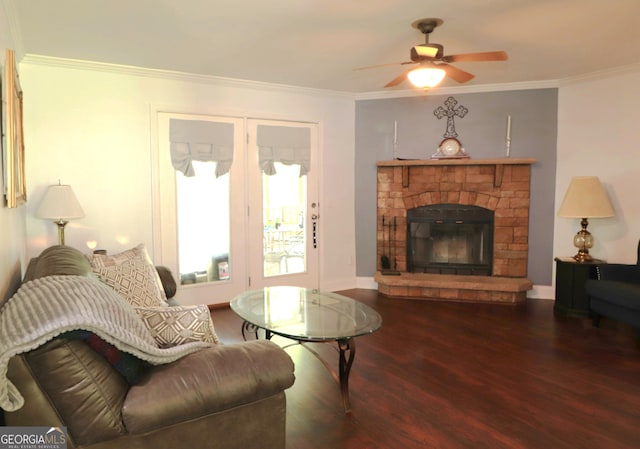 4650 Perry Rd, Gainesville, GA 30506 - living room with crown molding, a stone fireplace, a ceiling fan, baseboards, and wood finished floors