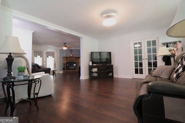 4650 Perry Rd, Gainesville, GA 30506 - living room featuring a glass covered fireplace, a ceiling fan, french doors, and wood finished floors