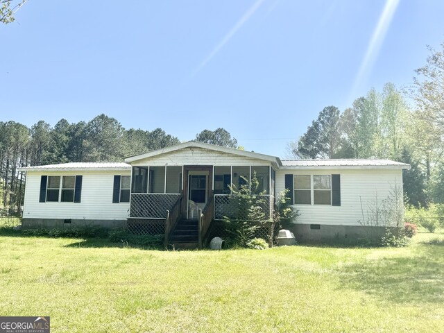 33 Keen Rd, Summerville, GA 30747 - manufactured / mobile home featuring crawl space, a sunroom, a front yard, and metal roof