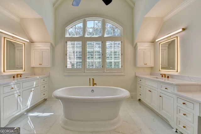 full bathroom with a sink, marble finish floor, and baseboards