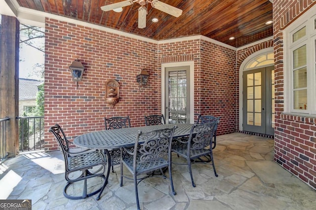 view of patio featuring ceiling fan and outdoor dining space