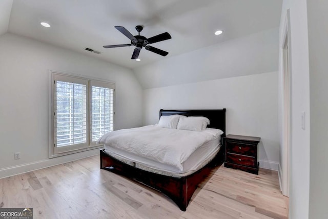 bedroom featuring recessed lighting, visible vents, and lofted ceiling