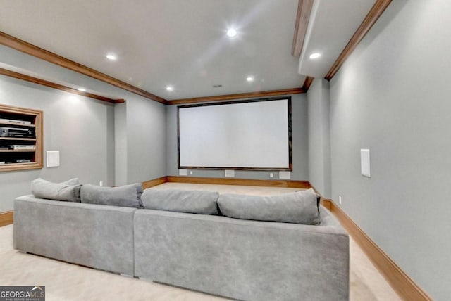 home theater room featuring recessed lighting, baseboards, and crown molding
