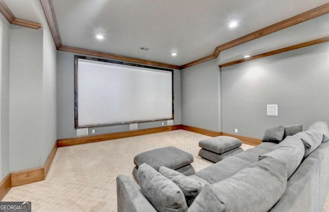carpeted home theater room with recessed lighting, visible vents, baseboards, and crown molding