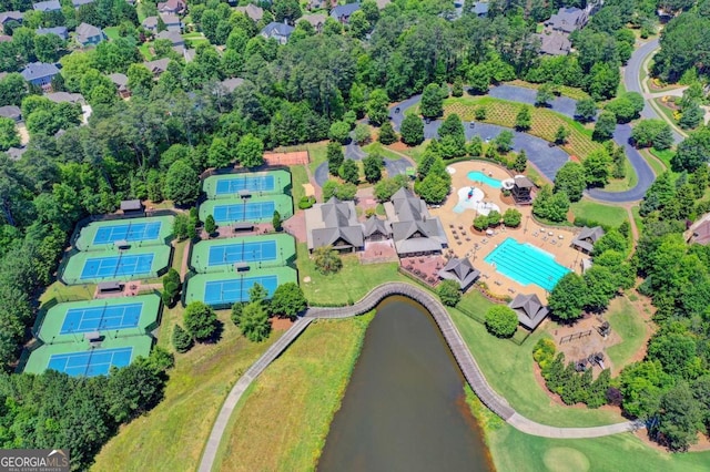 bird's eye view with a water view