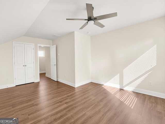 4343 Ainsley Mill Ln, Duluth, GA 30097 - interior space with lofted ceiling, baseboards, a ceiling fan, and wood finished floors