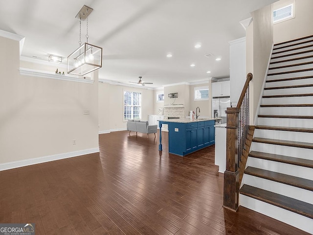 4343 Ainsley Mill Ln, Duluth, GA 30097 - stairs featuring recessed lighting, visible vents, ornamental molding, and ceiling fan
