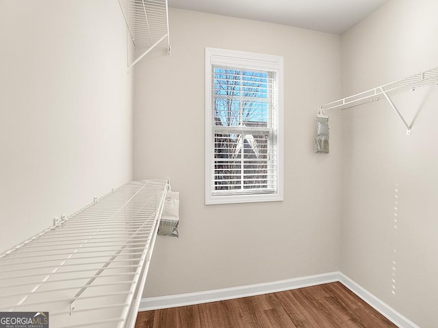4343 Ainsley Mill Ln, Duluth, GA 30097 - spacious closet with wood finished floors