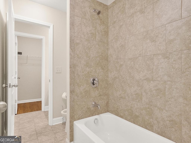 4343 Ainsley Mill Ln, Duluth, GA 30097 - bathroom with tile patterned floors, toilet, baseboards, and tub / shower combination