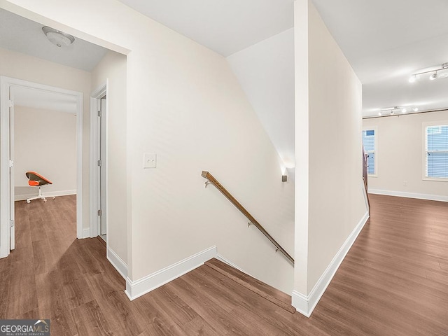 4343 Ainsley Mill Ln, Duluth, GA 30097 - hall with an upstairs landing, baseboards, and wood finished floors