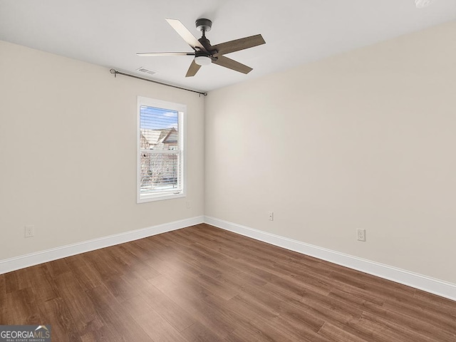4343 Ainsley Mill Ln, Duluth, GA 30097 - unfurnished room with ceiling fan, baseboards, dark wood finished floors, and visible vents