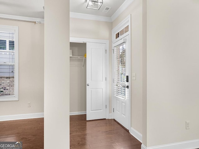 4343 Ainsley Mill Ln, Duluth, GA 30097 - entrance foyer with visible vents, baseboards, crown molding, and wood finished floors