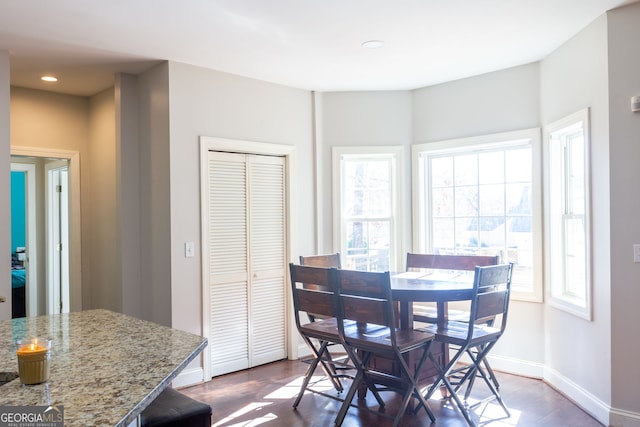dining area featuring baseboards, recessed lighting, and dark wood-style floors