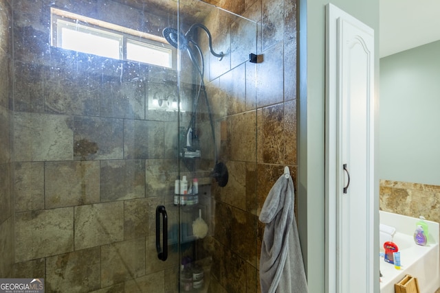 bathroom featuring a shower stall