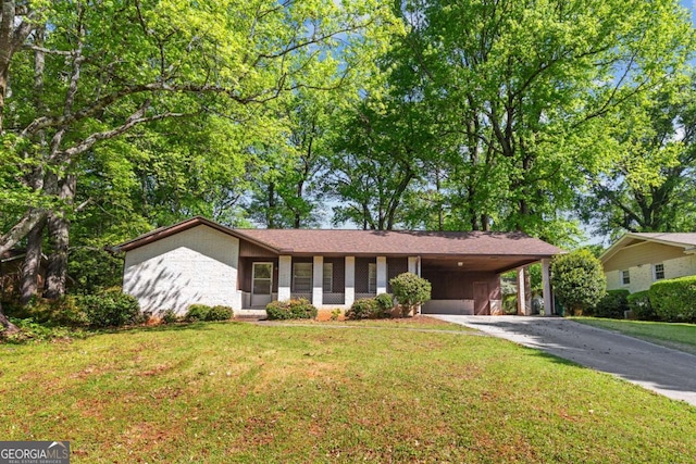 3944 Woburn Dr, Tucker, GA 30084 - single story home featuring concrete driveway, an attached carport, and a front lawn