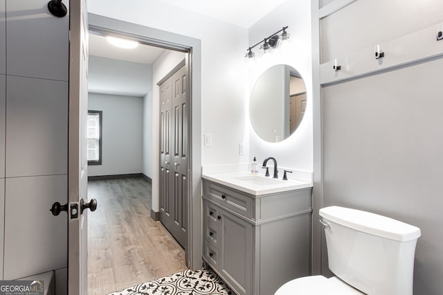1074 Peachtree Walk NE Unit 115, Atlanta, GA 30309 - bathroom with vanity and wood finished floors