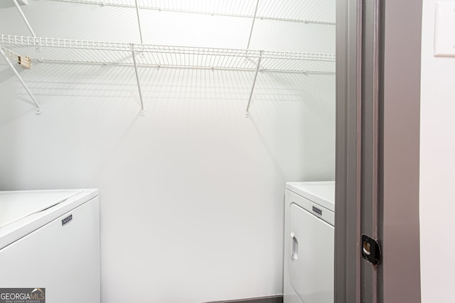 1074 Peachtree Walk NE Unit 115, Atlanta, GA 30309 - laundry room with washer and clothes dryer