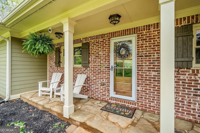 524 Allison Ln, Ball Ground, GA 30107 - property entrance with covered porch and brick siding