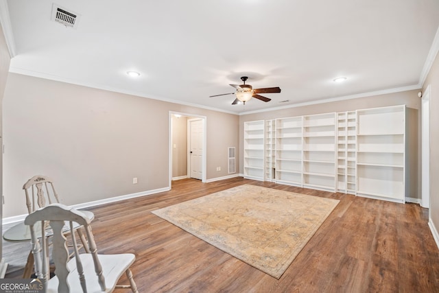 524 Allison Ln, Ball Ground, GA 30107 - unfurnished living room featuring ceiling fan, wood finished floors, ornamental molding, and recessed lighting