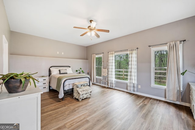 524 Allison Ln, Ball Ground, GA 30107 - bedroom with wood finished floors and ceiling fan