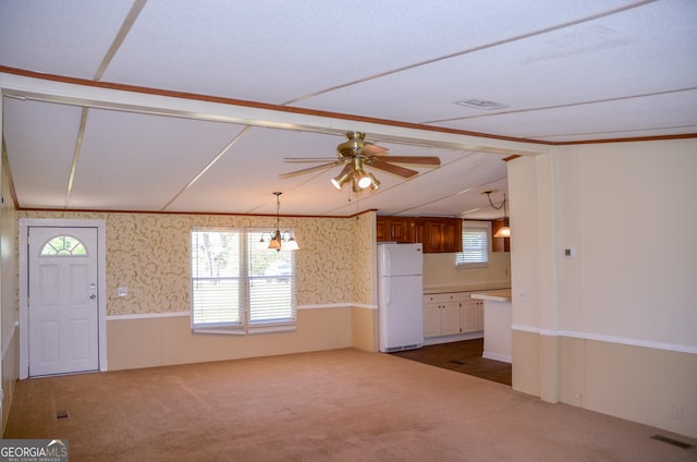 2055 Payne Pond Rd, Weston, GA 31832 - unfurnished living room featuring a wealth of natural light, a wainscoted wall, and carpet floors