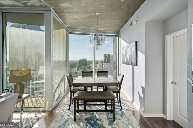 3324 Peachtree Rd NE Unit 1518, Atlanta, GA 30326 - interior space featuring visible vents, baseboards, a notable chandelier, wood finished floors, and expansive windows