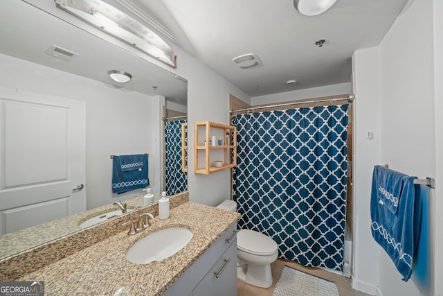 3324 Peachtree Rd NE Unit 1518, Atlanta, GA 30326 - full bathroom with vanity, visible vents, curtained shower, and toilet