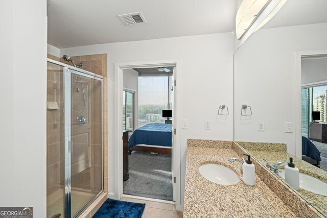 3324 Peachtree Rd NE Unit 1518, Atlanta, GA 30326 - full bath with vanity, a stall shower, tile patterned flooring, ensuite bath, and visible vents
