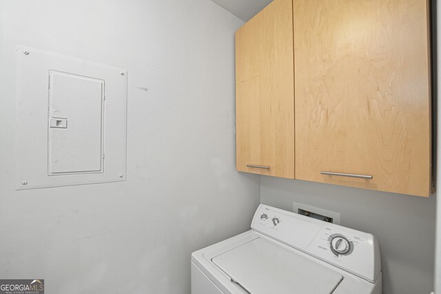 3324 Peachtree Rd NE Unit 1518, Atlanta, GA 30326 - clothes washing area featuring cabinet space, washer / dryer, and electric panel