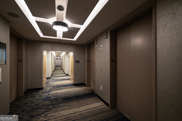 3324 Peachtree Rd NE Unit 1518, Atlanta, GA 30326 - corridor with a chandelier, carpet, and elevator