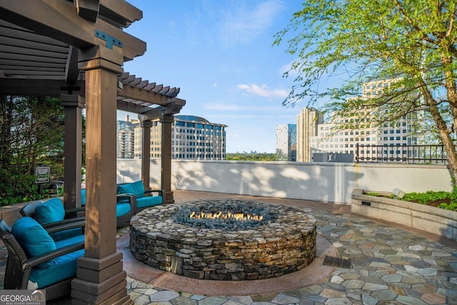 3324 Peachtree Rd NE Unit 1518, Atlanta, GA 30326 - view of patio / terrace with a pergola, a view of city, and an outdoor fire pit
