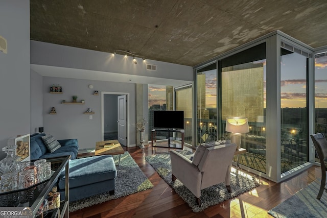 3324 Peachtree Rd NE Unit 1518, Atlanta, GA 30326 - living room featuring floor to ceiling windows, visible vents, and wood finished floors