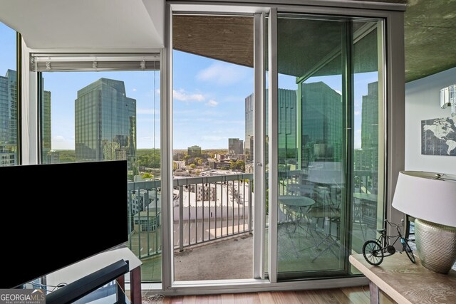 3324 Peachtree Rd NE Unit 1518, Atlanta, GA 30326 - entryway with wood finished floors, a view of city, and floor to ceiling windows