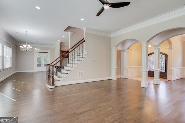 476 Walnut Rd, Hoschton, GA 30548 - unfurnished living room with a ceiling fan, arched walkways, ornate columns, wood finished floors, and stairs