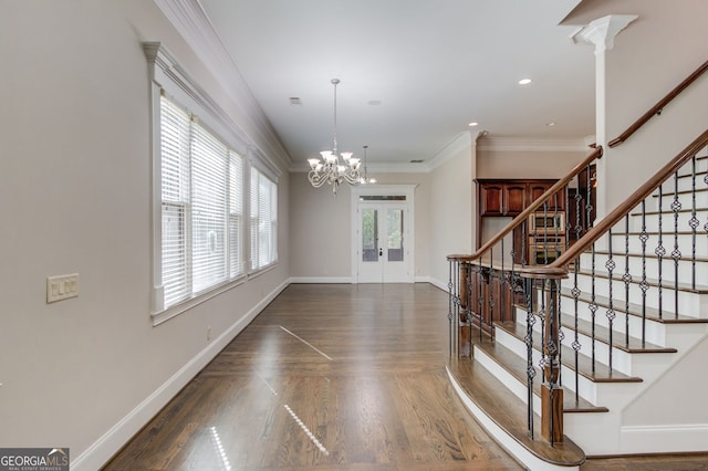 476 Walnut Rd, Hoschton, GA 30548 - interior space featuring french doors, stairway, ornamental molding, a chandelier, and wood finished floors