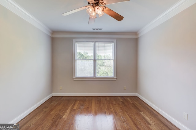 476 Walnut Rd, Hoschton, GA 30548 - empty room with wood finished floors, a ceiling fan, and ornamental molding