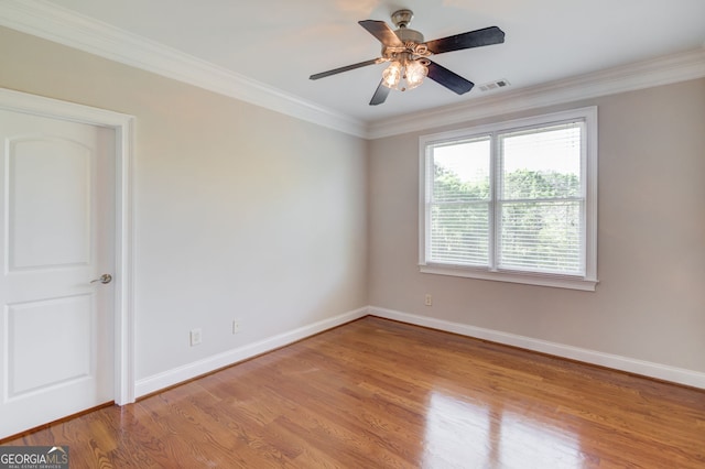 476 Walnut Rd, Hoschton, GA 30548 - unfurnished room featuring crown molding, wood finished floors, and ceiling fan