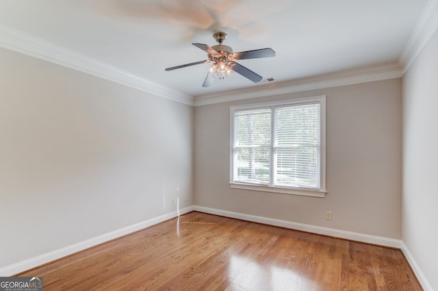 476 Walnut Rd, Hoschton, GA 30548 - empty room featuring light wood-style floors, crown molding, and a ceiling fan